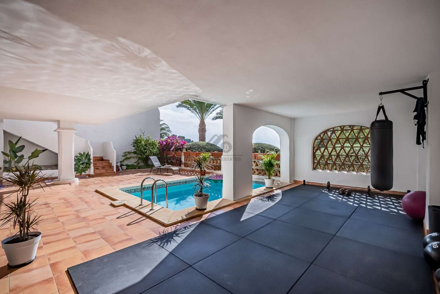 Fantástica casa adosada con piscina privada en Benalmadena